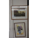 A collection of three framed artworks, including an ink landscape study,