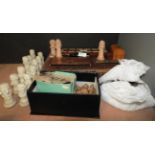 A mixed collection of chess sets, draughts boards,
