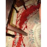 A large Chinese carpet originally purchased from Harrods,