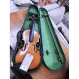 Two early 20th Century student violins in original wooden coffin cases