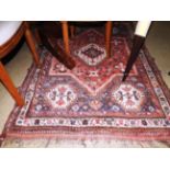 An antique Persian Qashgai rug,