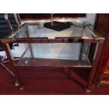 A pair of 20th century chrome and glass two tier occasional table.