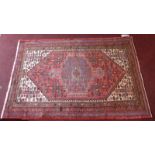 A fine north west Persian Heriz rug 156cm x 106cm central jade medallion with repeating petal