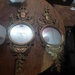 A pair of giltwood wall mirrors with ant