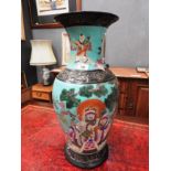 A Chinese style bulbous green vase with