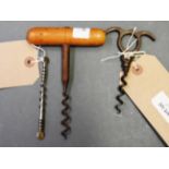 A bygone wooden handled corkscrew, a met