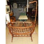 A late 19th/early 20th Century French swinging cradle