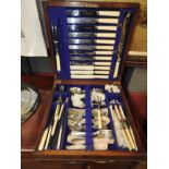 An oak cased canteen of silver palte cutlery by H J A Bensley (qty)