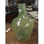 A pair of Venetian style green glass carboys (2)