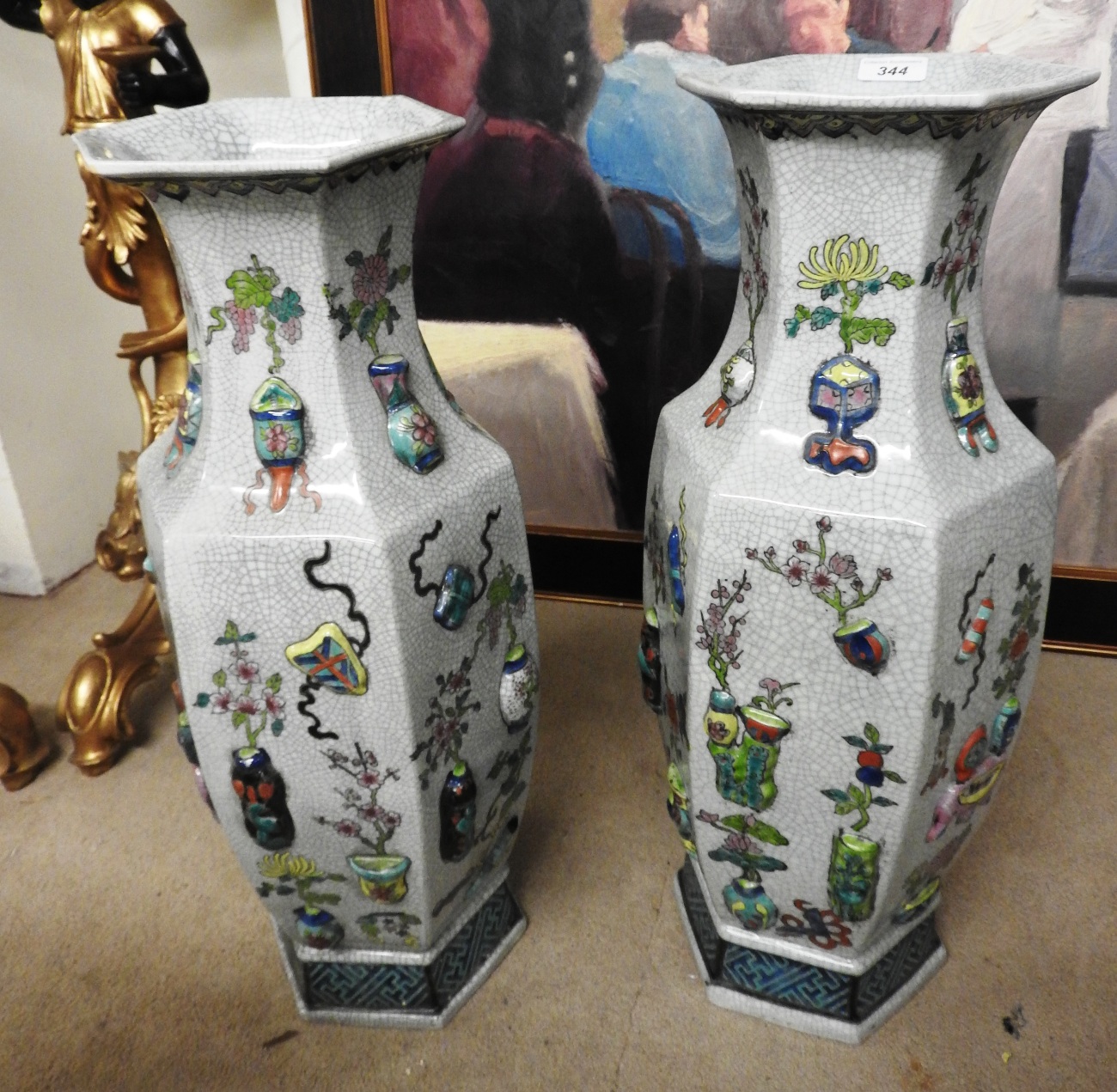 A pair of Chinese style crackleware octagonal vases