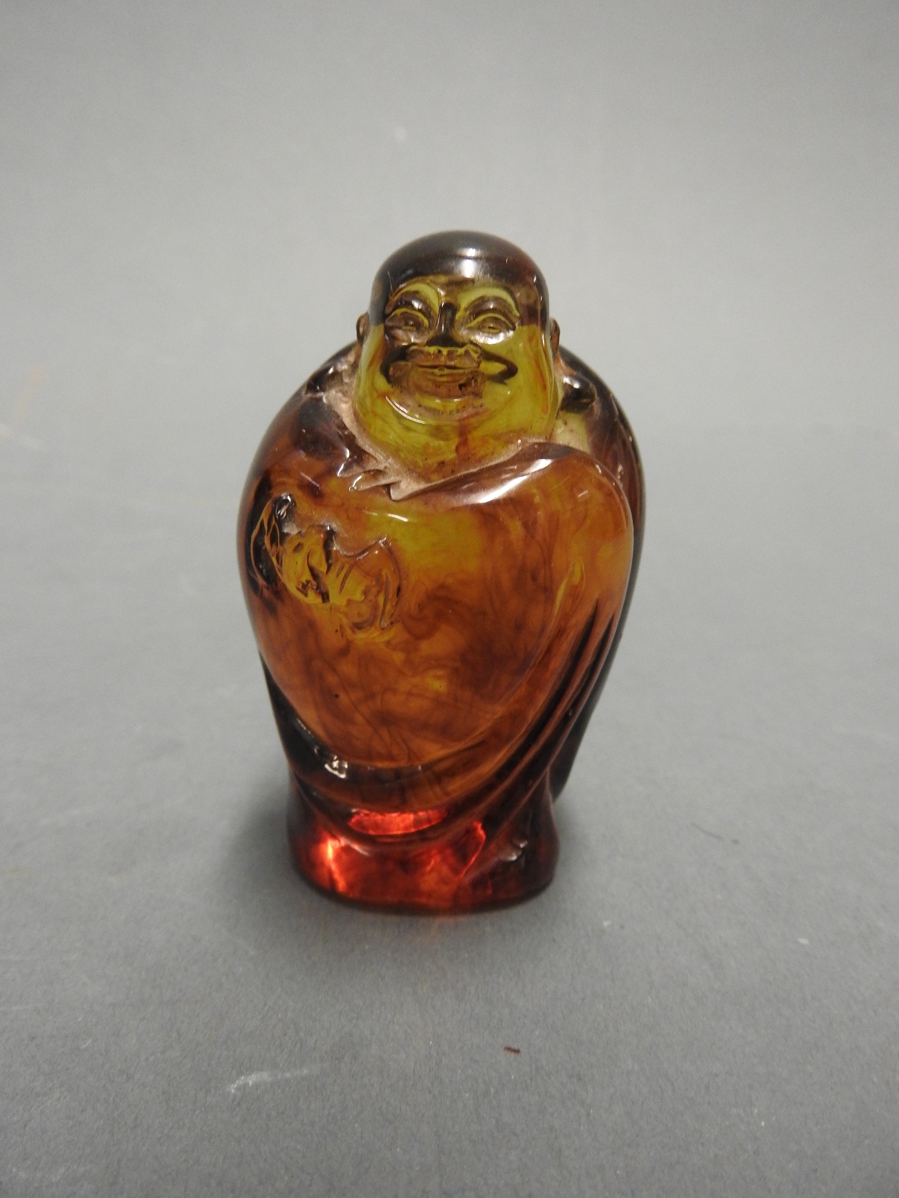 A faux amber Buddha