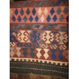 A large Anatolian kilim rug,