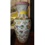 A large chinese style vase with floral decoration