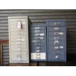 A set of three silver galvanised filing cabinets