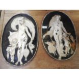 A pair of 19th Century oval cast iron portrait plaques with classical detail