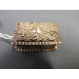 An Edwardian solid silver repousse patch box