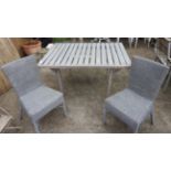 A grey painted kitchen table, along with two wicker Lloyd loom style chairs (3).