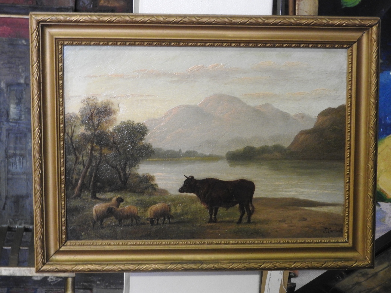 A 19th Century oil on canvas landscape study with a cow and sheep in the fore, - Image 2 of 2