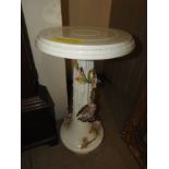 A porcelain plant stool with butterfly and floral decoration (A/F)
