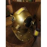 A brass ornamental divers helmet