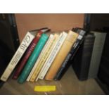 A collection of various antique collectors books