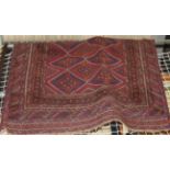 An Afghan geometric rug diamond design