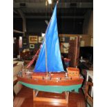 Two large teak junk remote control boats with remote controls