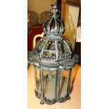 A Continental style distressed green metal hall lantern along with small matching light (2) H. 70cm.