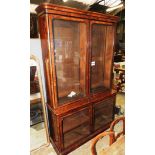 A 19th Century library bookcase of substantial proportions, the twin glazed doors requiring shelves,