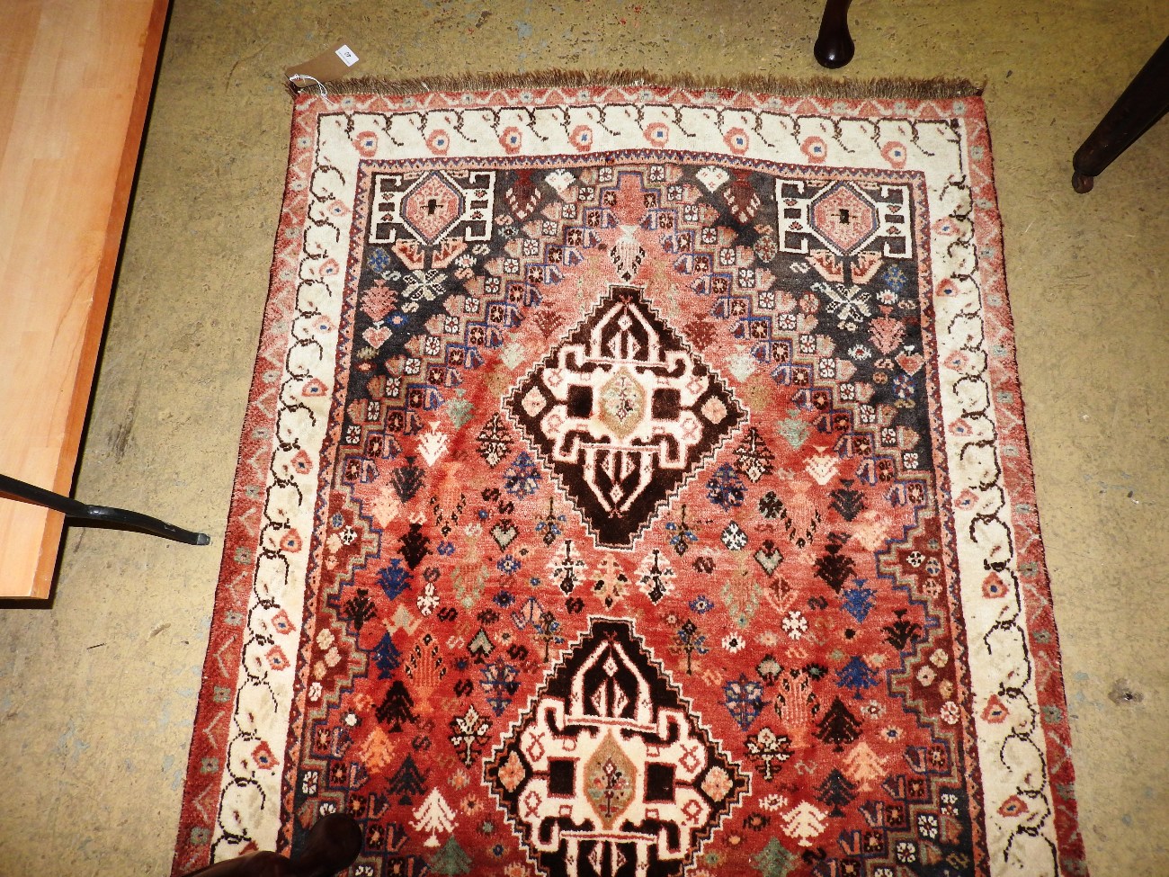 An antique Persian Qashgai rug,