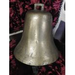 An early 20th Century ships bell and brass cased clock