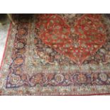 A large Keshan rug,
