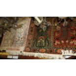 A collection of four various part silk prayer rugs