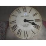 A vintage wooden clock face