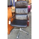 A 20th Century swivel desk chair,