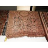 A handmade antique Bashir rouge rug