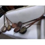 A collection of six 19th Century and later copper bed pans (6)