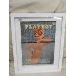 An entire Playboy 1963 rare collectors magazine in white frame