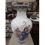 A large Chinese style vase with pictorial detail