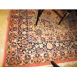 An antique Persian kashan carpet,
