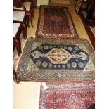 A collection of three rugs including a Hamden rug