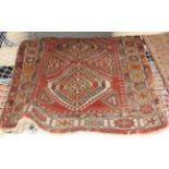 An antique Shiravan Cacassian red ground geometric pattern