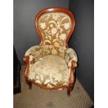 A 19th century Victorian upholstered salon armchair,