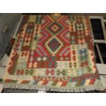 A contemporary vibrant kilim rug,