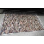 A set of three contemporary carpets of small proportions,