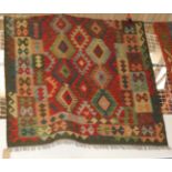 A contemporary Afgan kilim rug,