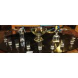 A collectionb of various glassware, to include a centre bowl, two decanters, and glasses.