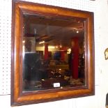 A Victorian walnut wall mirror,