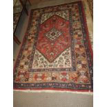 A Persian design rug, the central medall