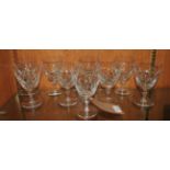 A suite of cut glass drinking goblets, b